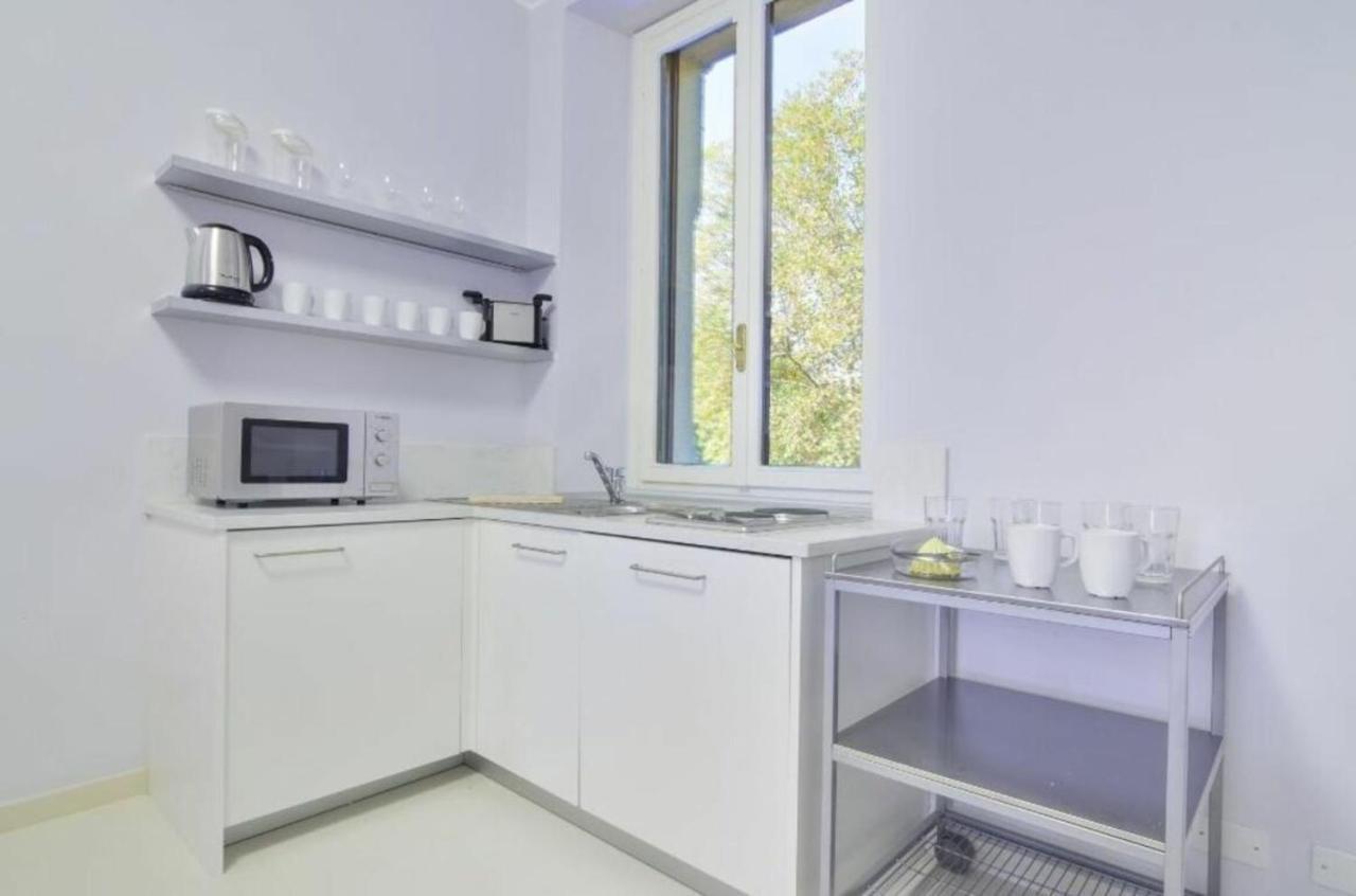 Bacone Liberty Olimpia Apartment Milan Bagian luar foto